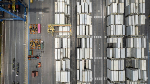 istock Container terminal in port and transport to ship 1357151898