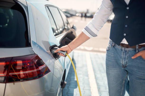 istock Electric car charging.Loading energy of an  car 1357155200
