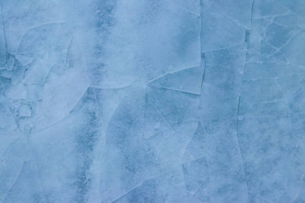 istock Texture of the cracked ice. Winter background 1357159673