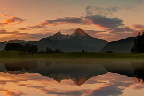 istock Watzmann in Alps, dramatic reflection at sunset - National Park Berchtesgaden 1357161160