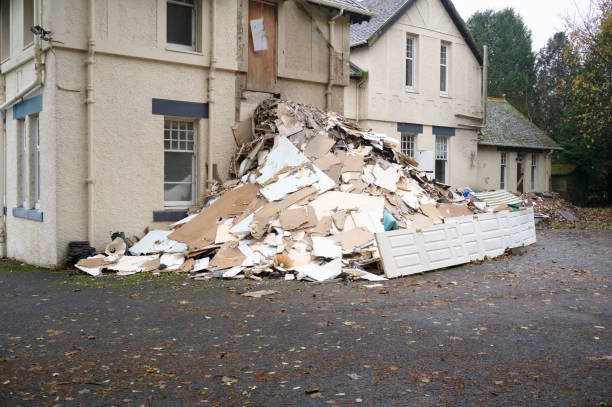 istock Demolition in progress of derelict house on construction building site 1357163285