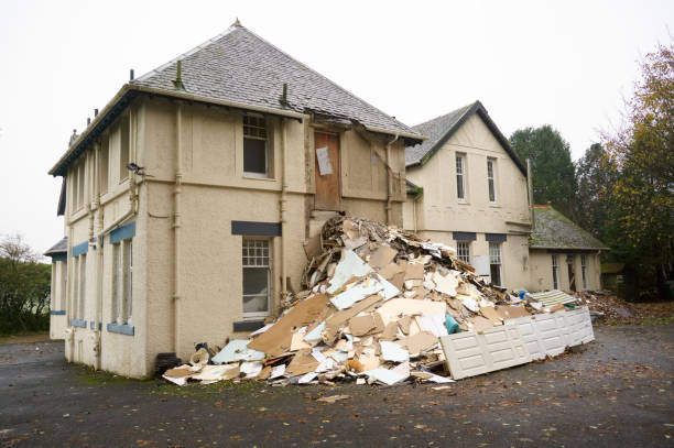 istock Demolition in progress of derelict house on construction building site 1357164070