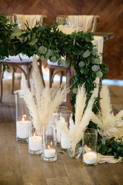 istock Modern wedding d?cor with candles in glass 1357165298