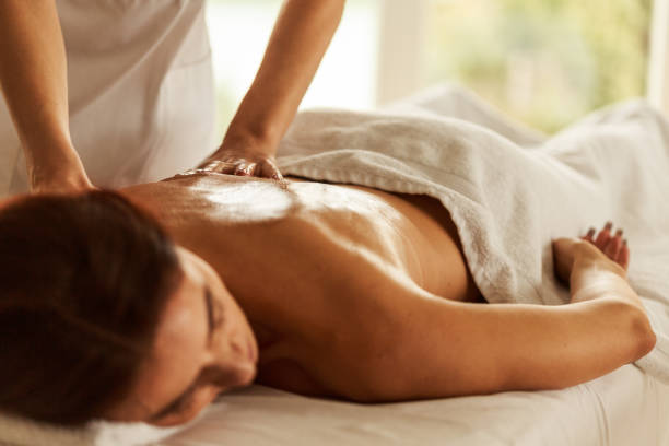 Woman enjoying a therapeutic back massage