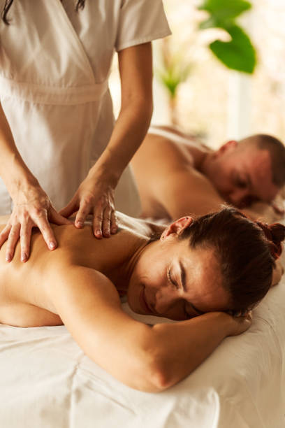 istock Couple having a relaxing spa massage 1357169412