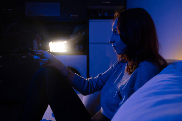 istock beautiful woman changing channels with remote 1357172842