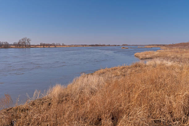 Broad Western River in the Great Plains Broad Western River in the Great Plains on the Platte River Near Kearney, Nebraska kearney nebraska stock pictures, royalty-free photos & images