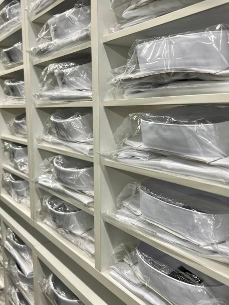 istock Shirts on shelfs in department store 1357180695