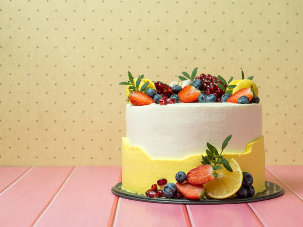 istock beautiful birthday cake decorated with berries with place for text 1357180710