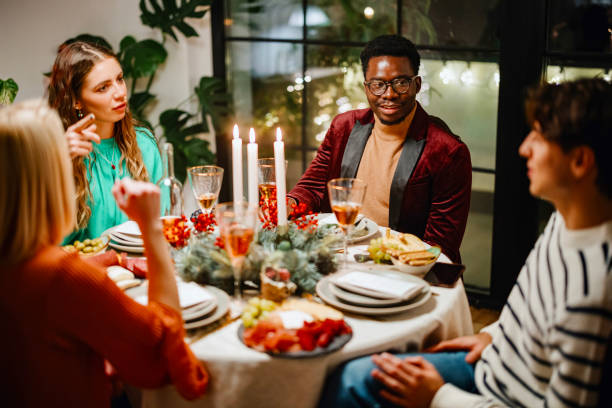 istock Friends celebrating New Year at home 1357192166