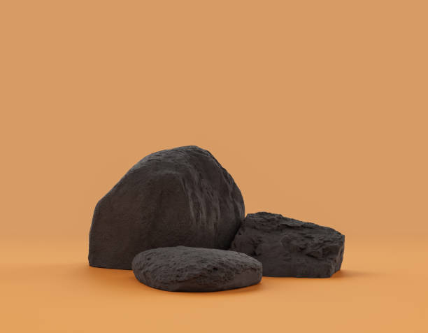 istock Isolated dark rocks in a yellow background for product displays with copy space, 3d Rendering 1357196902