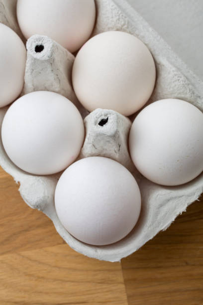 istock overhead view of raw white eggs 1357201377