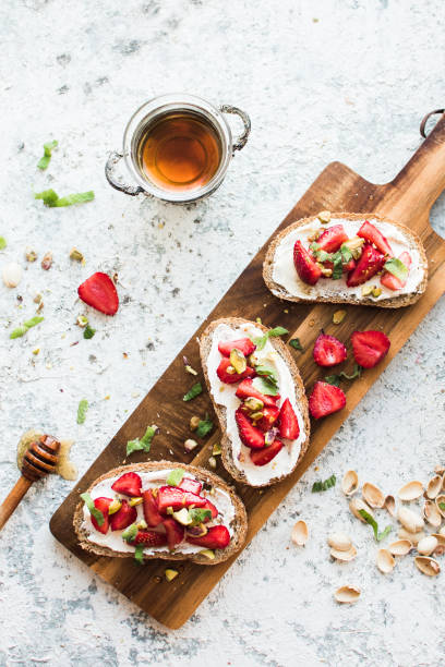 istock Sandwich with strawberries, soft cheese and honey 1357204603