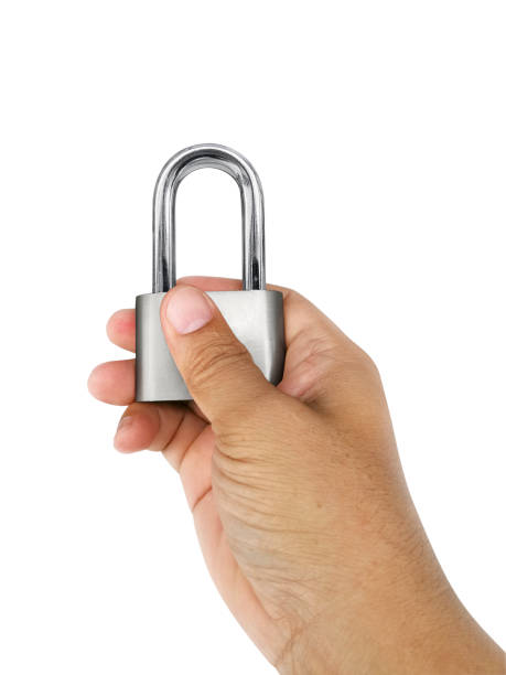 istock Padlock in hands on isolated white background 1357213884