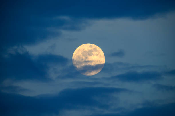 istock full moon in the daytime 1357217280