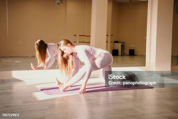 Workshop Of Air Yoga And Stretching In Yoga Studio Stock Photo