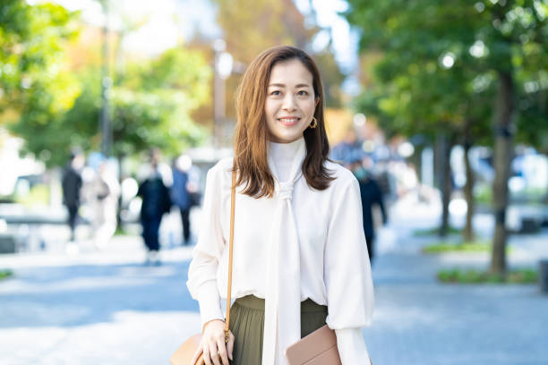 istock woman commuting in office casual style 1357230566