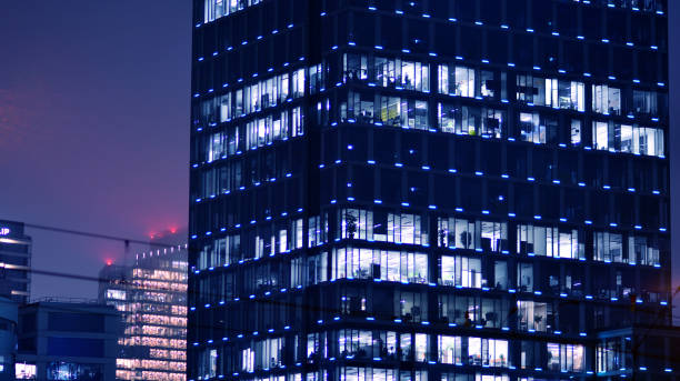 istock Corporate building at night - business concept. 1357235439