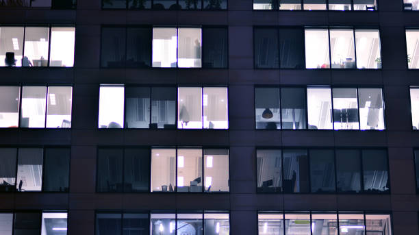 istock Corporate building at night - business concept. 1357235513