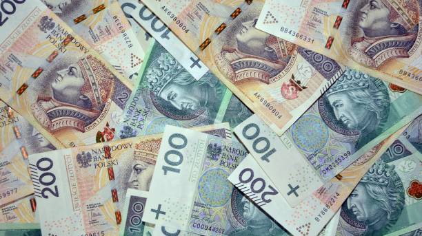 istock Background made of polish banknotes (polish zloty). 1357235597