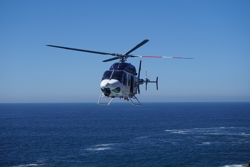 Sydney, NSW, Australia, December 3, 2021.
The helicopter is patrolling the cliffs at Watsons Bay