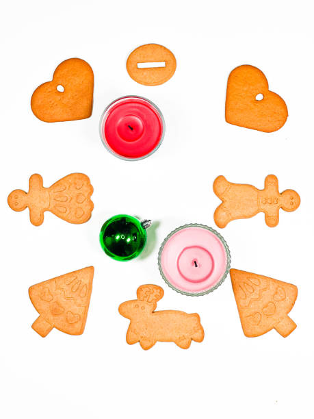 istock Flatley with candles and ginger cookies on a white background. 1357240078