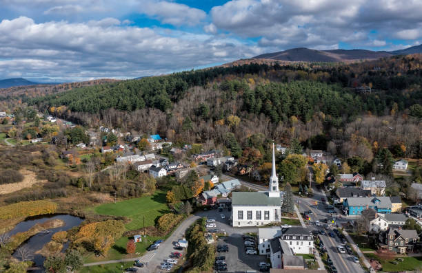 aerial view of charming small town stowe in vermont. mountains with autumn multicolor trees - town rural scene road new england imagens e fotografias de stock