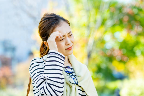 istock A woman who cares about head pain 1357243614