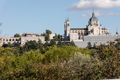 Gardens in Madrid river in autumn overlooking the Cathedral of La Almudena and Royal Palace, Madrid, Spain