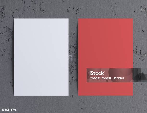 Blank A4 Poster White And Red On Stone Wall Stock Photo - Download Image Now - Book Cover, Flyer - Leaflet, Template