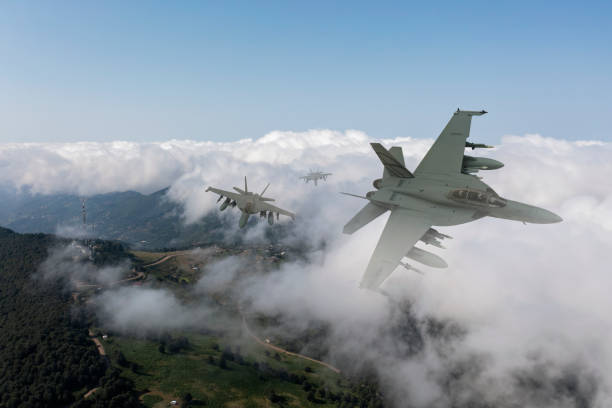 Jet fighters flying over the clouds. Jet fighters flying over the clouds. hornet stock pictures, royalty-free photos & images