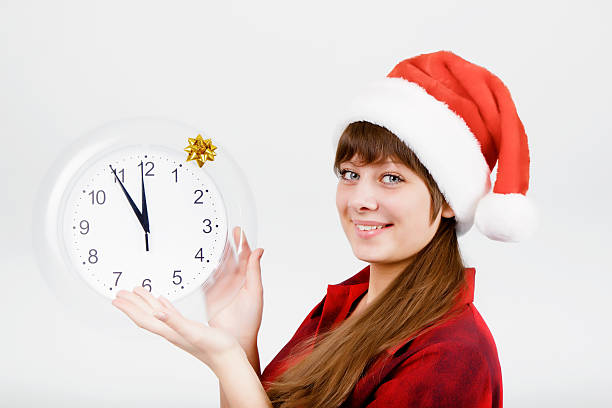 istock attractive girl with a clock 135725394