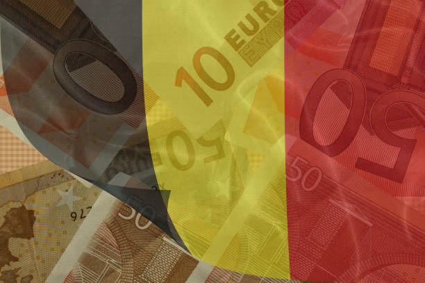 istock Belgium flag transparently on euro banknotes 1357254965