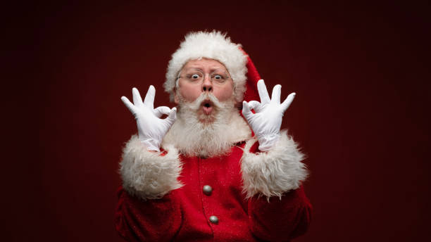 istock Santa Claus showing ok sign 1357255187