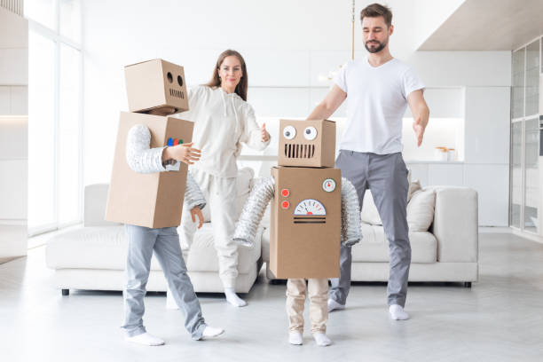 istock Family playing robots at home 1357255777