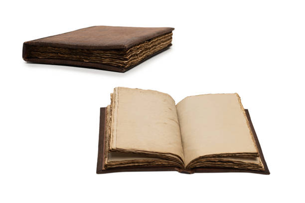 istock An old brown book isolated on white background. 1357257616