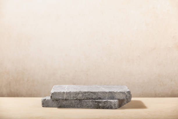 Stone podium for packaging and cosmetic presentation. Monochrome beige template for mockup, banner