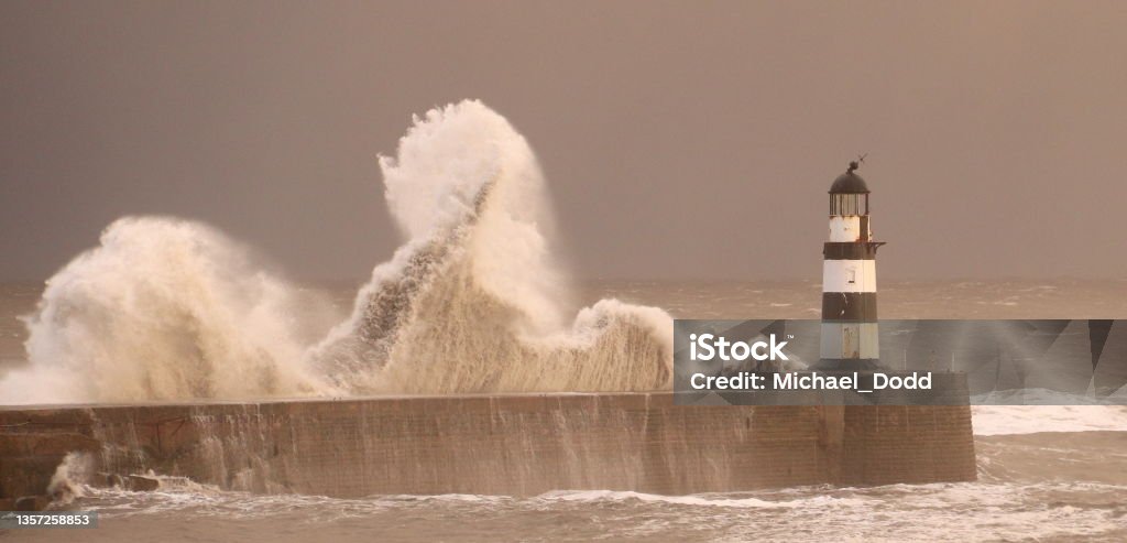Seaham Lighthouse, Storm Arwen Seaham Lighthouse (near Sunderland) crashed by waves during Storm Arwen on Saturday 27th November 2021. One of the worst storms in living memory. Caused severe damage in the North of England and Scotland. Storm Stock Photo
