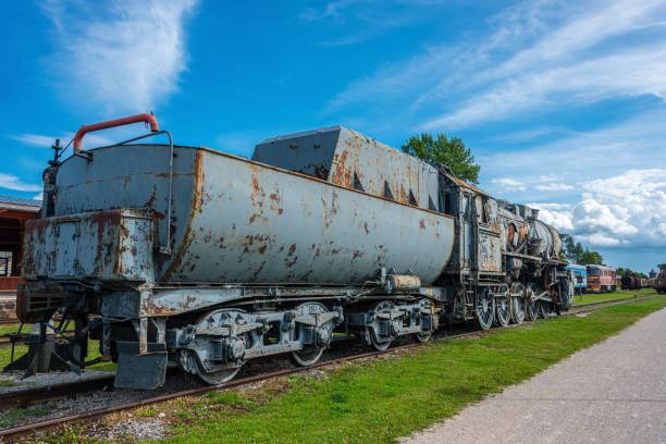 Ancient steam locomotive at railway station in summer, Haapsalu, Estonia 05.08.2020