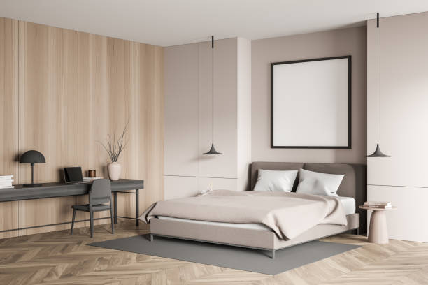 istock Empty square frame in beige bedroom with home office desk. Corner view. 1357261534