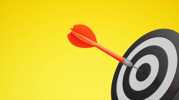 istock 3D Rendering Red Dart aim to Dartboard target Isolated on yellow Background 1357261698