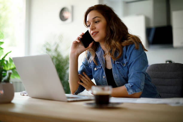 istock Young woman working at home 1357264767
