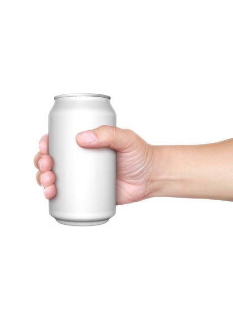 istock Man holding aluminum can isolated on white background 1357266845