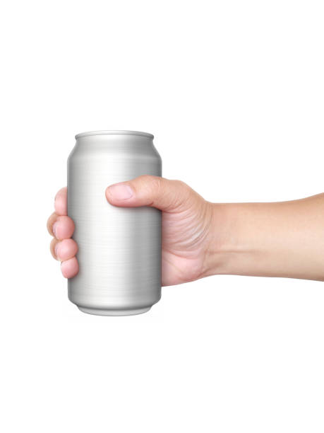 istock Man holding aluminum can isolated on white background 1357267922
