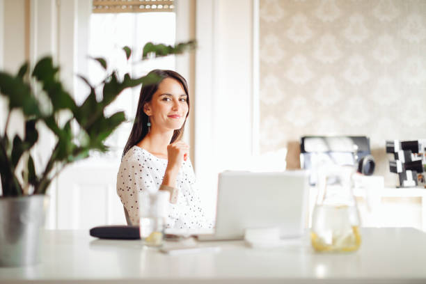istock Young woman working in her offfice 1357269996
