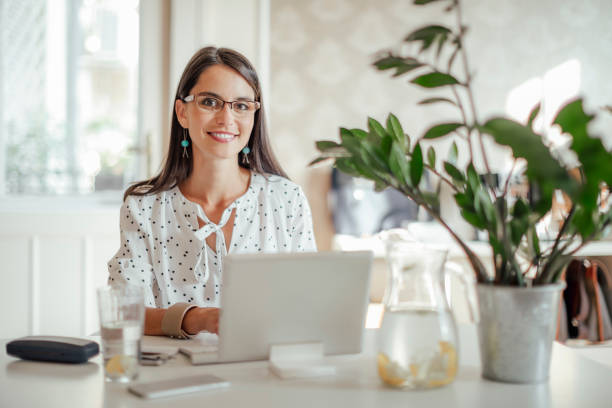 istock Young woman working in her offfice 1357270022