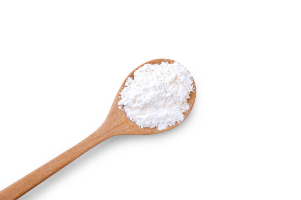 Calcium hydroxide powder (Deydrated lime) in wooden spoon isolated on white background. Calcium hydroxide powder (Deydrated lime) in wooden spoon isolated on white background. Top view. Flat lay. hydroxide stock pictures, royalty-free photos & images