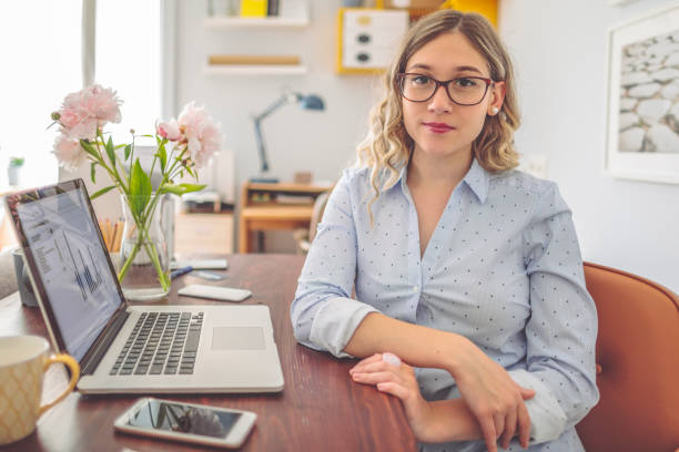istock Young woman at home 1357270349
