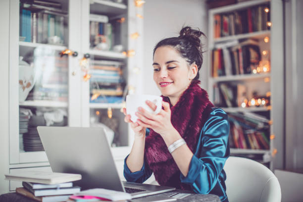 istock Young woman at home 1357270408