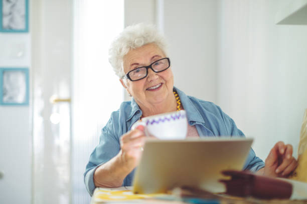 istock Senior woman at home 1357271353